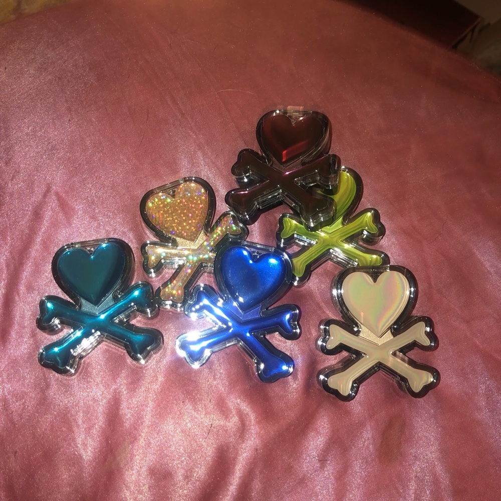 6 adorable Tokidoki eyeshadows. 💜🌙🖤🌼🦋🌸